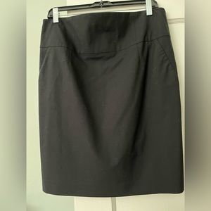 Banana Republic, black wool skirt, size 14 but can fit smaller due to stretch.